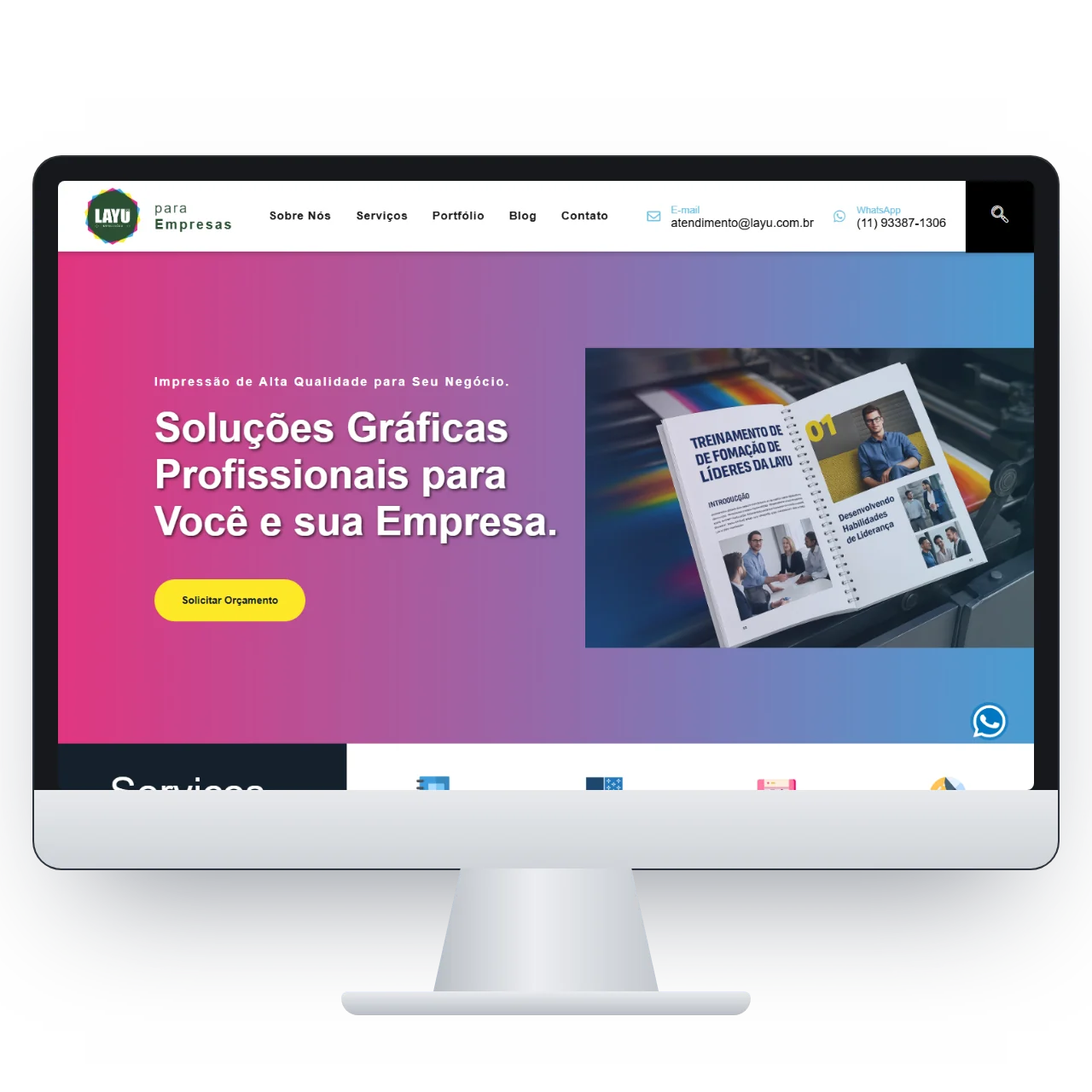 Home do site institucional da Layu Empresas em um monitor